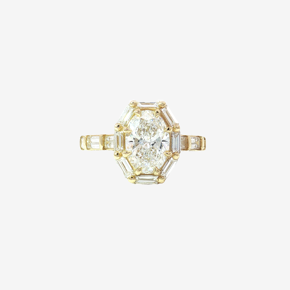 Oval Brilliant and Baguette Diamond Vintage-Inspired Halo Ring in Yellow Gold