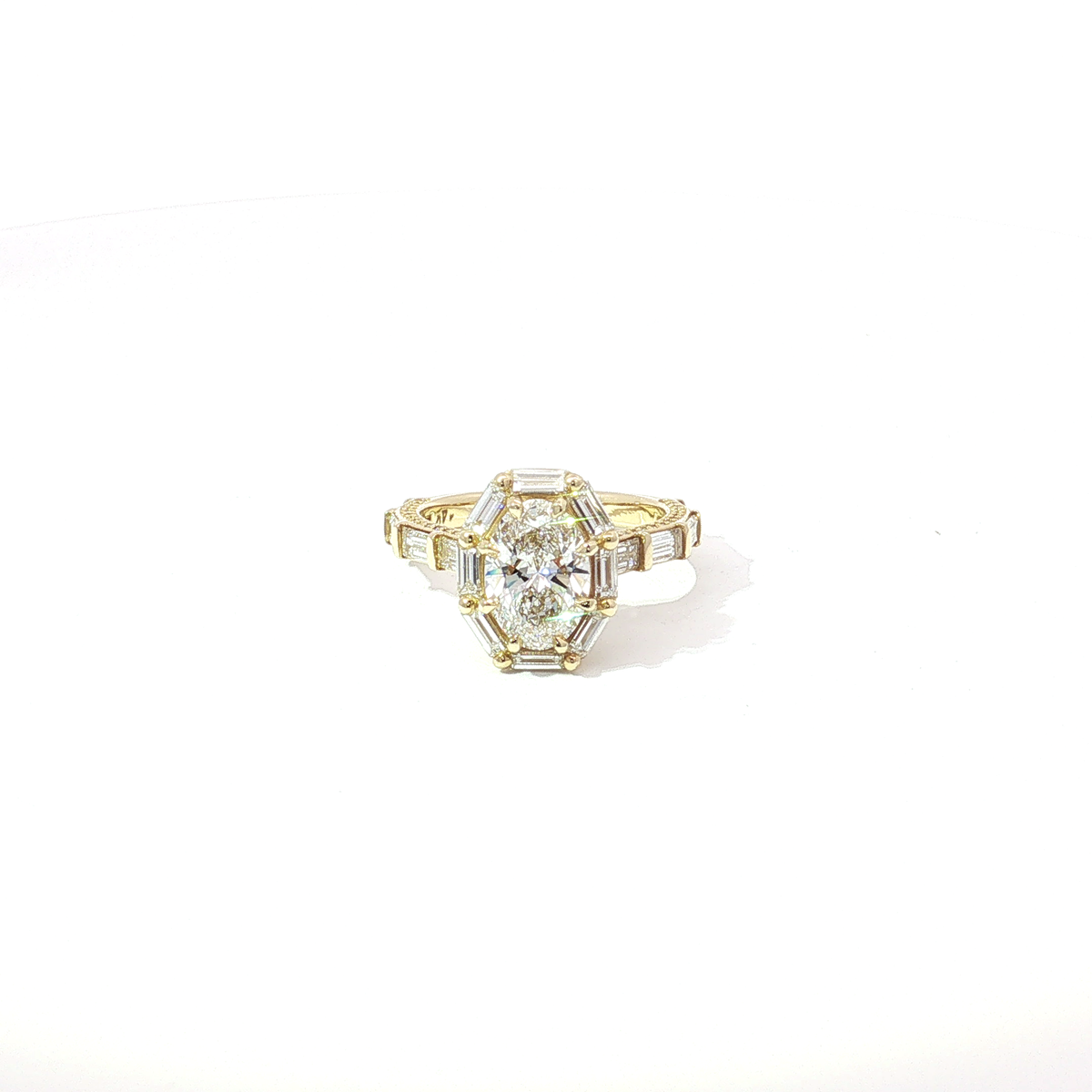 Oval Brilliant and Baguette Diamond Vintage-Inspired Halo Ring in Yellow Gold