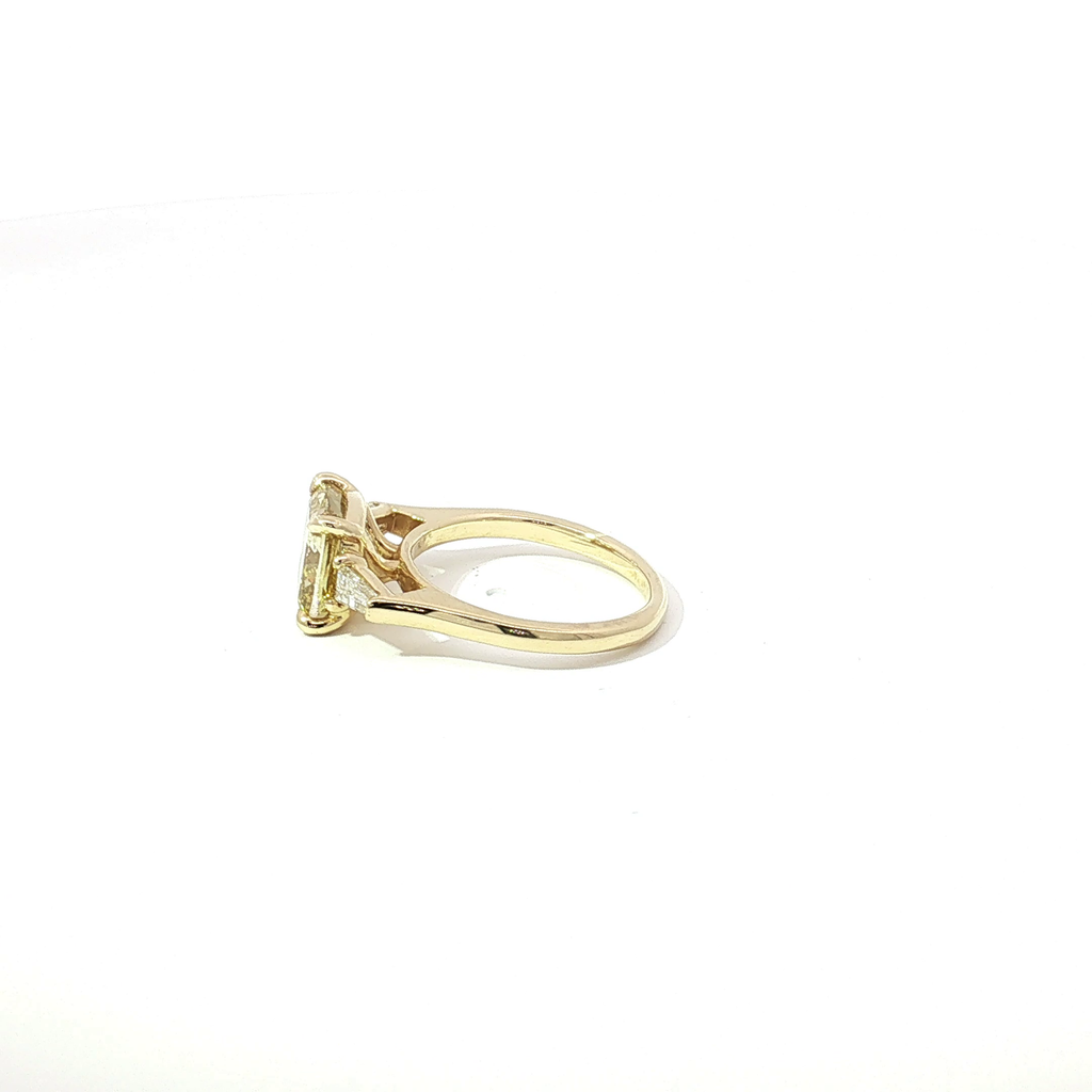 3 CT Fancy Yellow Cushion Lab Diamond Three-Stone Engagement Ring in Yellow Gold