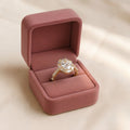 Oval Brilliant and Baguette Diamond Vintage-Inspired Halo Ring in Yellow Gold