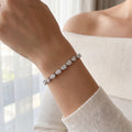 7 CTS Pear Shape Lab Diamond in 14K White Gold Tennis Bracelet